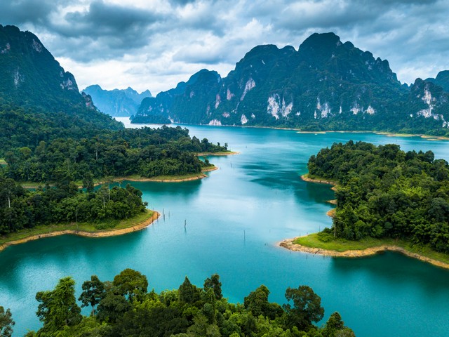 Aerial photos from drones on beautiful lake in mountain at Ratchaprapha Dam and Cheow Lan Lake, Khao Sok, Thailand