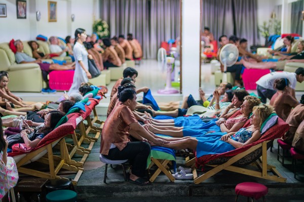 Tourists are relaxing on massage